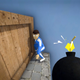 A first-person shot shows a Crab Game player who finds someone hiding behind a wooden crate and stares bug eyed at the bomb in their hand.